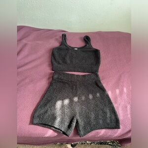 Extremely soft set. Top and shorts both size small lots of stretch! Never worn